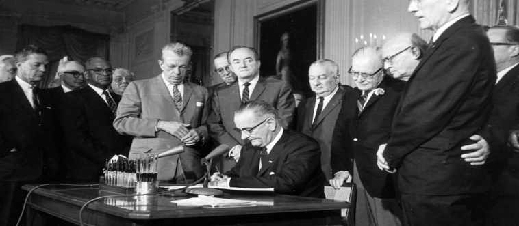 Picture the Oval Office desk in 1964—ink is flowing and history is being rewritten. Which U.S. president put his signature on the legendary Civil Rights Act?