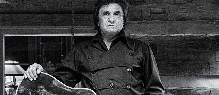 Picture a shadowy, cool silhouette stepping right out of a classic noir storyboard. He wore only dark colors and sang live behind prison walls. Who is this legendary "Man in Black"?