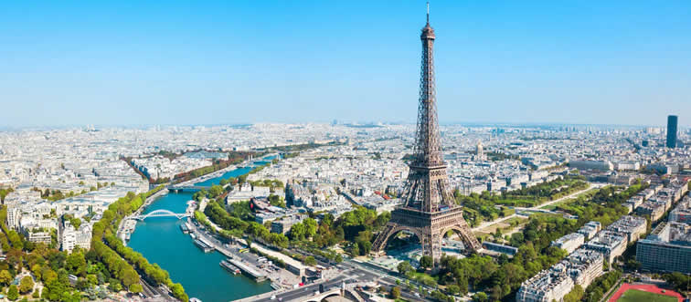Freeze-frame! That gorgeous iron tower reaching into the clouds—what classic landmark are we looking at?