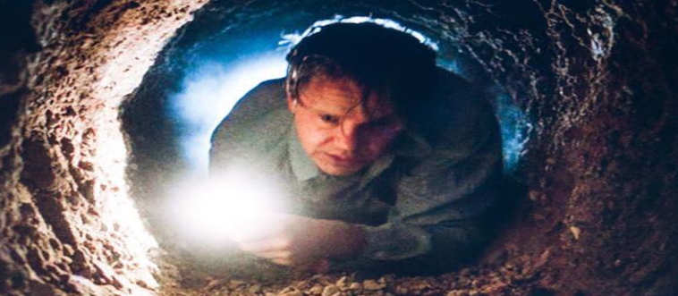 Picture the ultimate escape scene: a fellow spends years chipping away at a wall with a pocket-sized tool, all to enjoy a super-long, super-stinky crawl through a drainpipe.