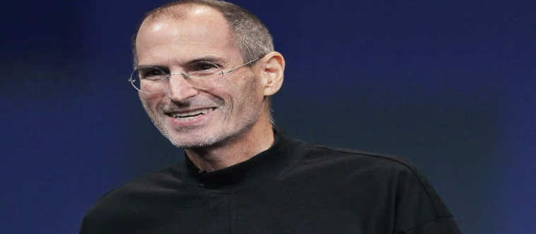 Which Apple visionary was famous for his signature black turtlenecks?