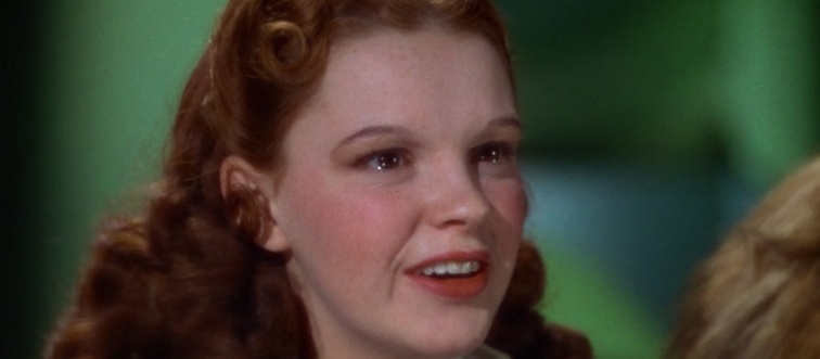 Grab your red slippers and follow the yellow brick road! Which legendary film stars the sweet farm girl Dorothy Gale?